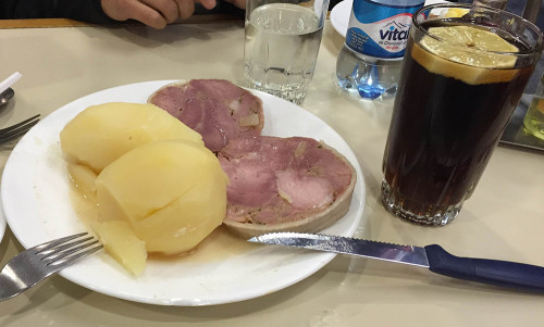 Lunch, piscola with meat. 